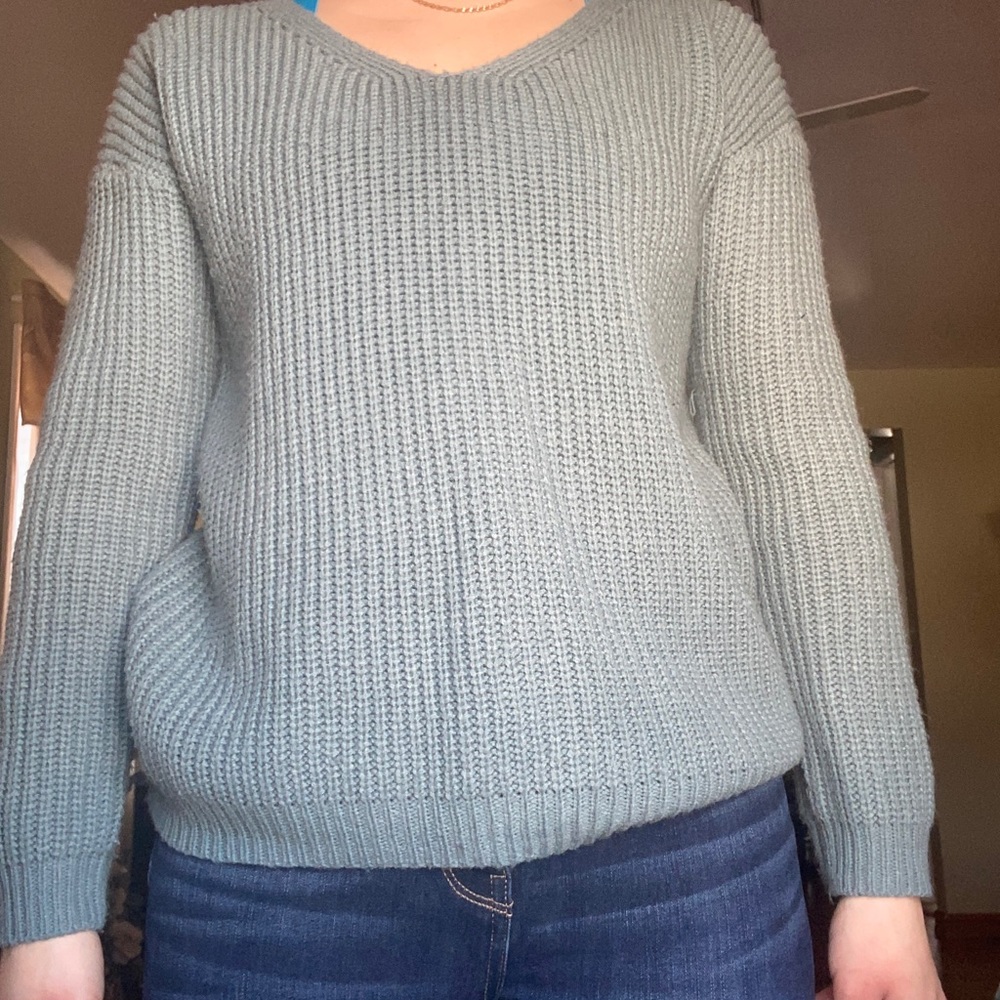 Knit sweater with knot detail on back